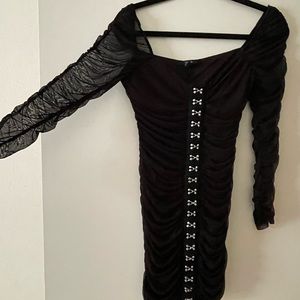Tight fitting dress. Mesh sleeves. Worn once